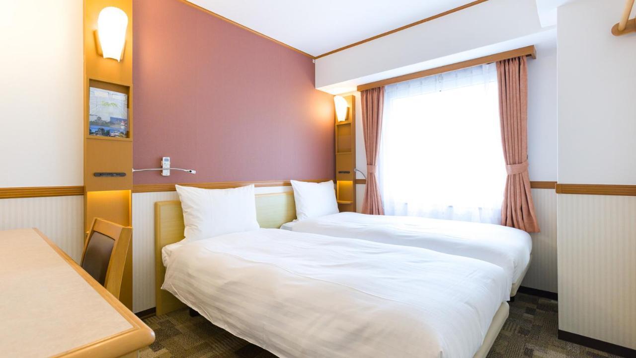 Toyoko Inn Tokyo Shinagawa-Eki Takanawa-Guchi Tóquio Exterior foto