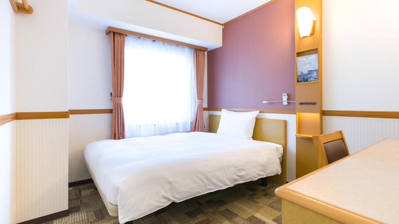Toyoko Inn Tokyo Shinagawa-Eki Takanawa-Guchi Tóquio Exterior foto